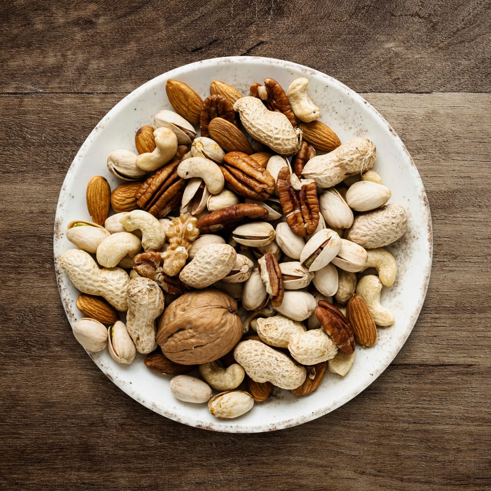 Energy Mix for Hair Growth- Take a handful of almonds, walnuts, and sunflower seeds, along with one tablespoon of pumpkin seeds.